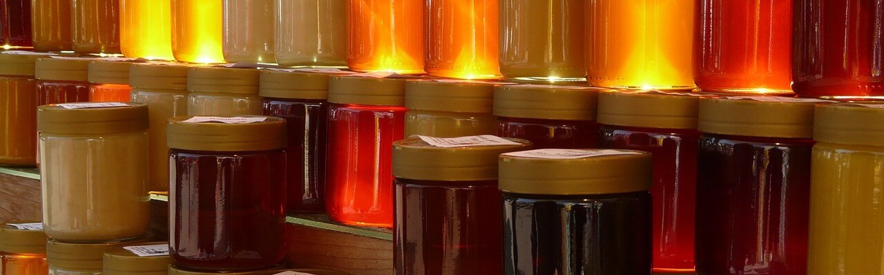 Jars of different colors of honey